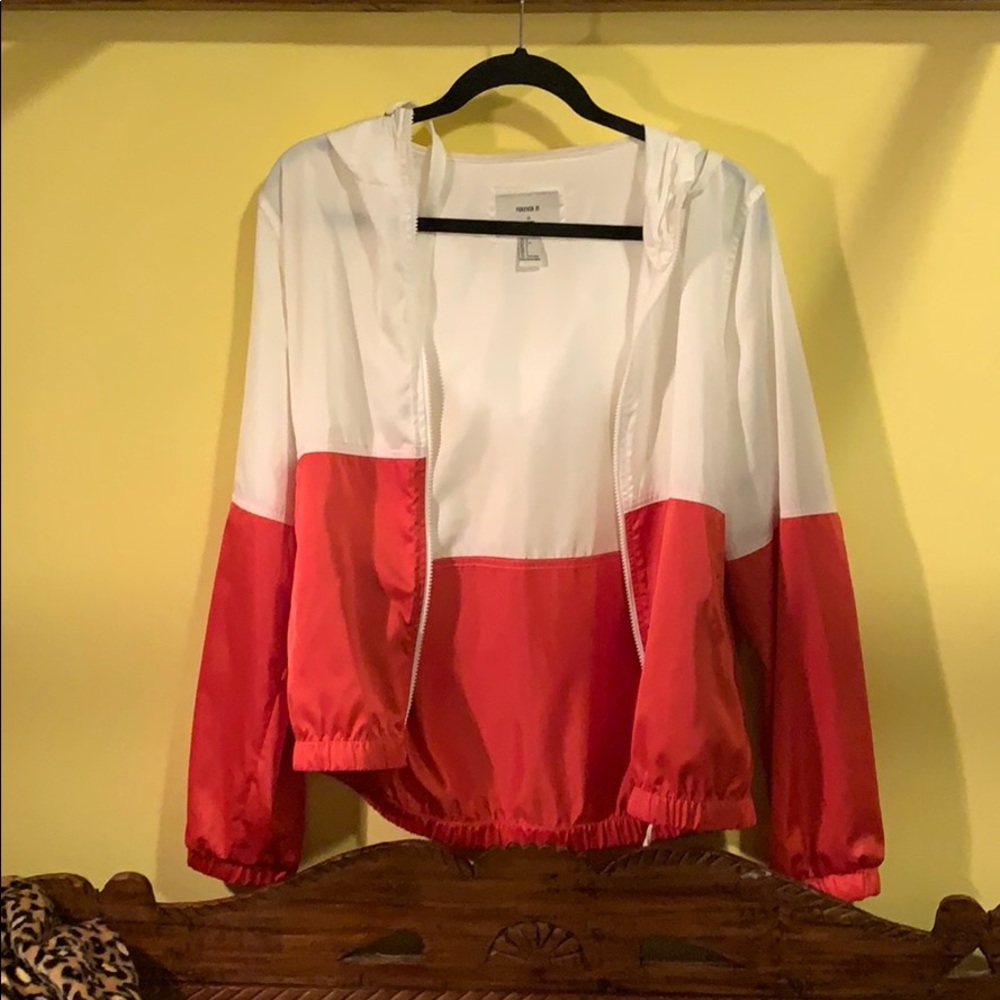 Red and white colorblocked windbreaker